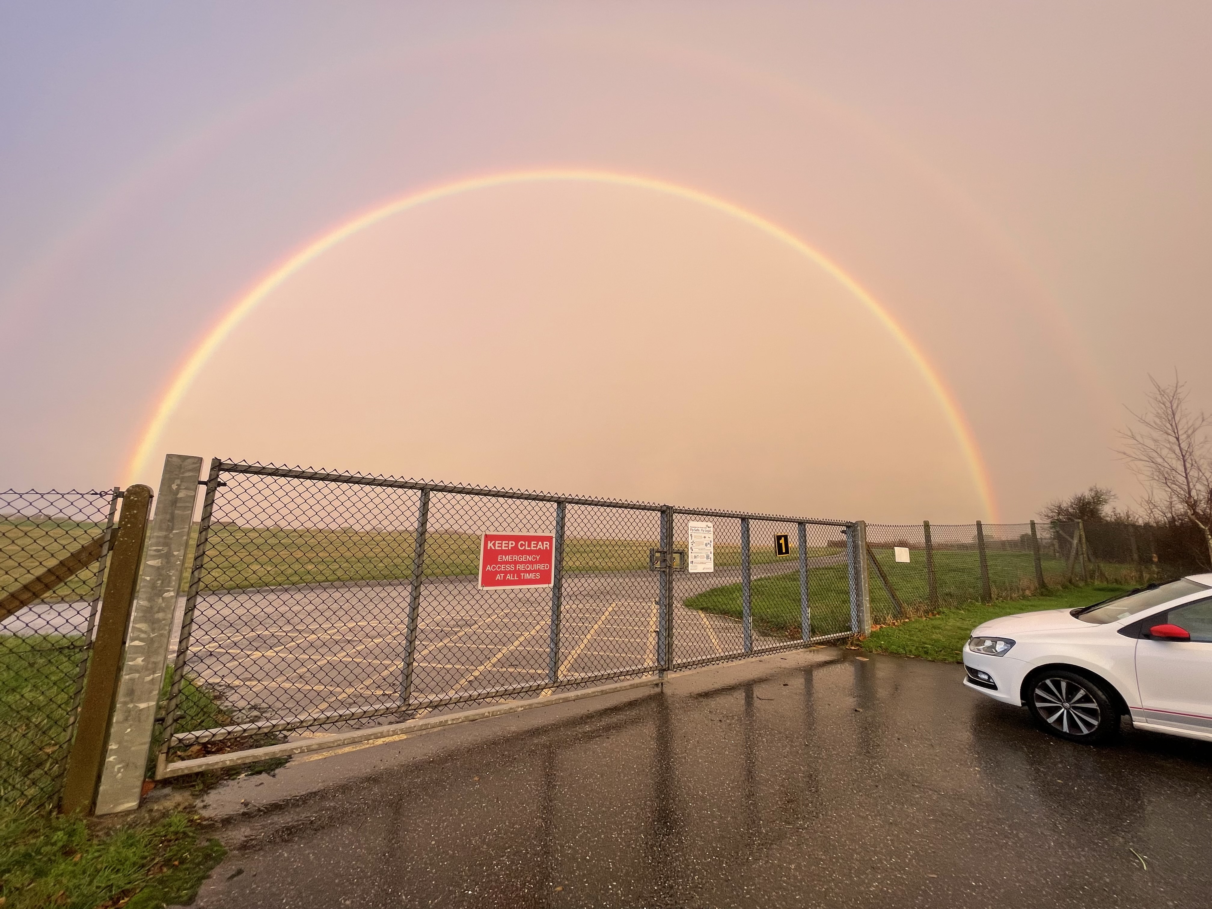 A vivid double rainbow over Guernsey Airport on the day of Dave’s celebration of life service.